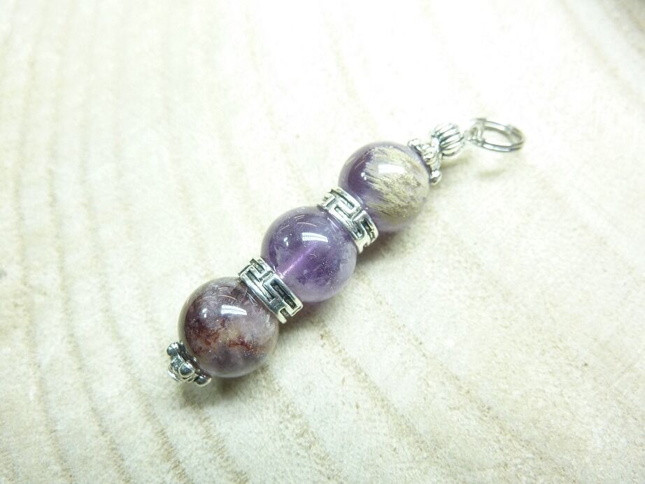 Pendentif Super seven cacoxénite 10 mm