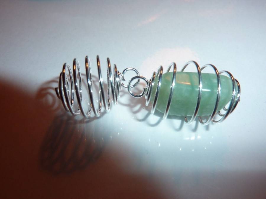 1 SPIRALE CAGE 1.2 CM X 1.3 CM EXTENSIBLE JUSQU'A 2.5 CM