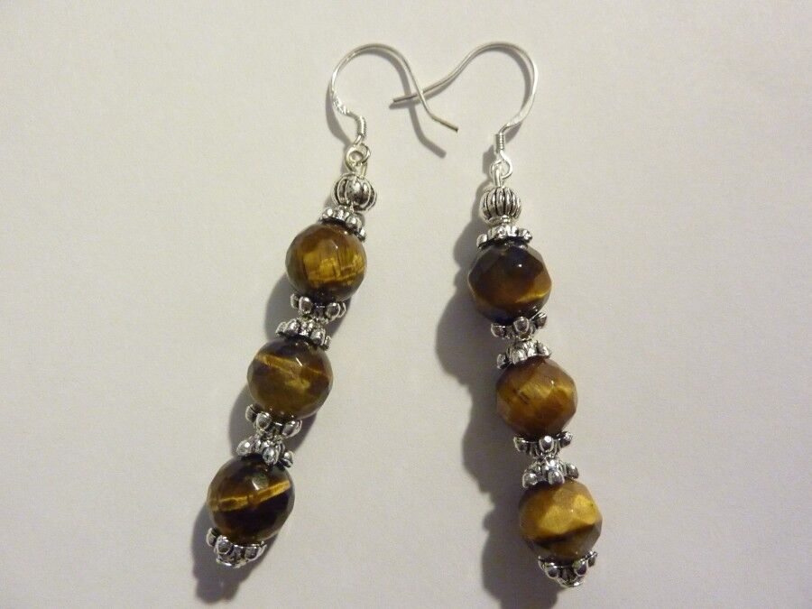 BOUCLES D'OREILLES PROTECTION OEIL DE TIGRE 8 MM A FACETTES